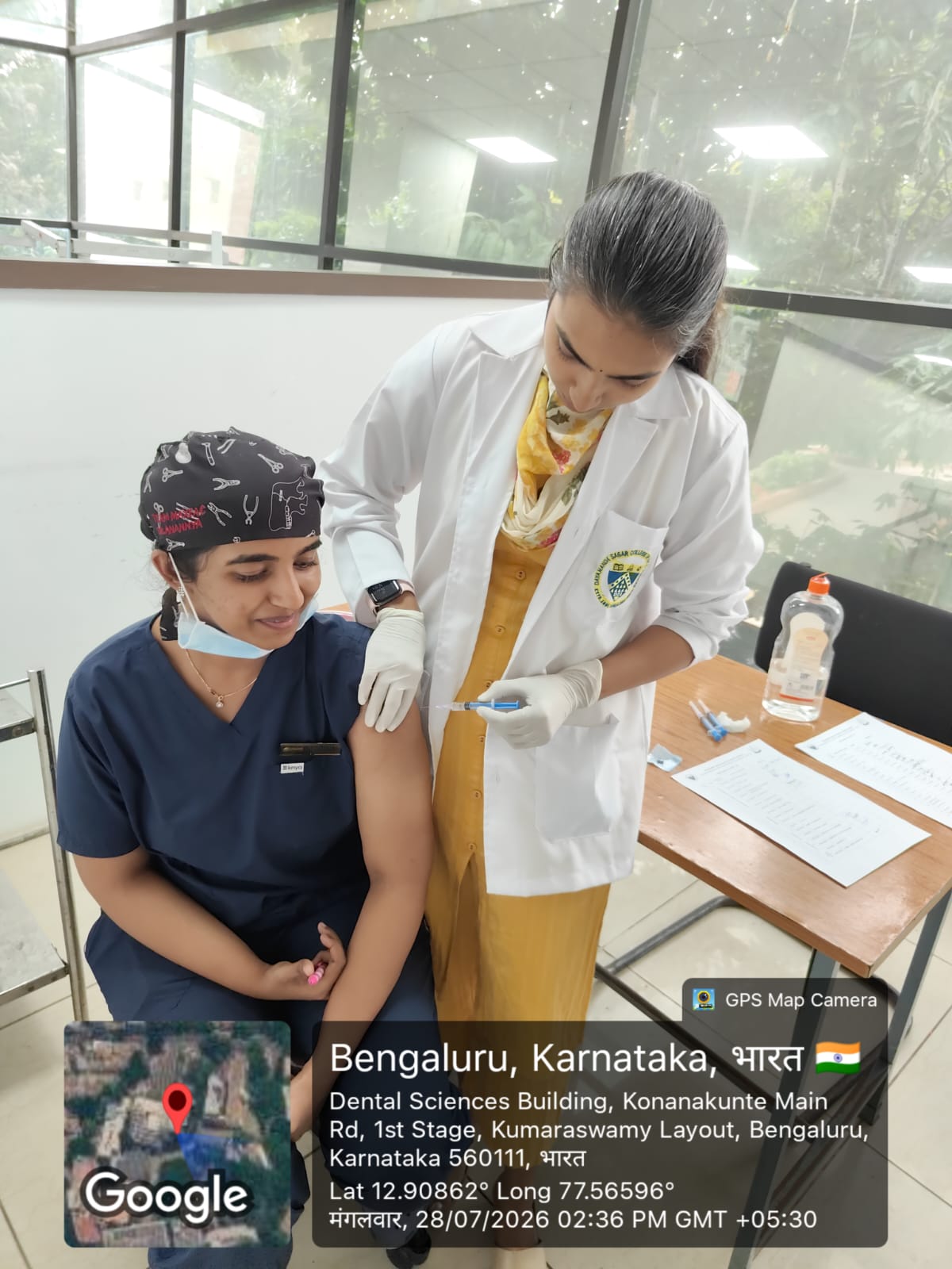 Second dose of vaccine administration by doctor